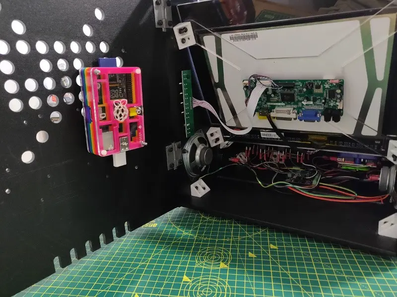 The rear interior after its first clean. The MDF is shining. The Pi is visible in its multicoloured case.