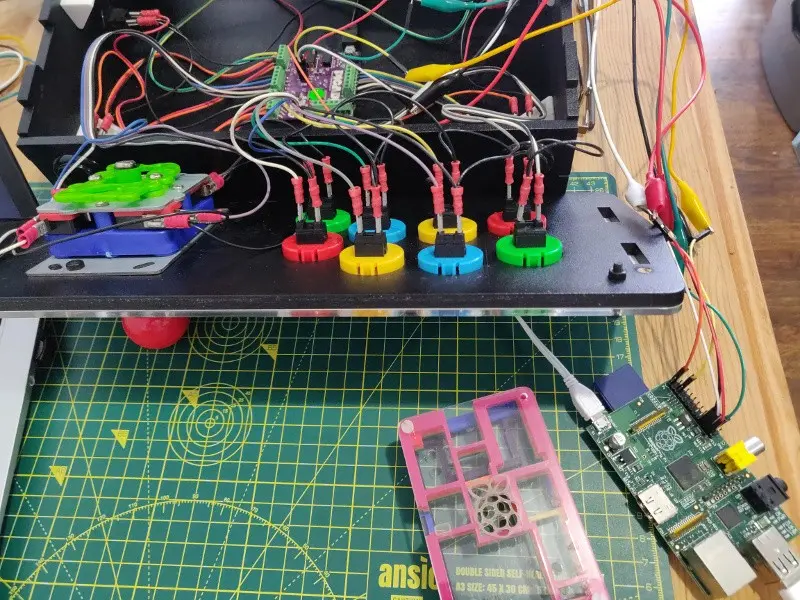 The underneath of the front of the Picade showing how the buttons are all wired up. A veritable rats nest of wiring.