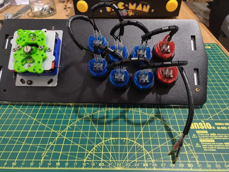 Wiring up the new buttons. No more rats nest as these are kept tidy with cable tidies.